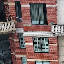 Empire-Building-Extreme-Rope-Access-Multi-Level-Pressure-Washing-Transformation-in-Houston-TX 0
