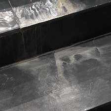 Safe Efflorescence Removal in Houston | Reviving Black Tile, Stone Steps & Facades